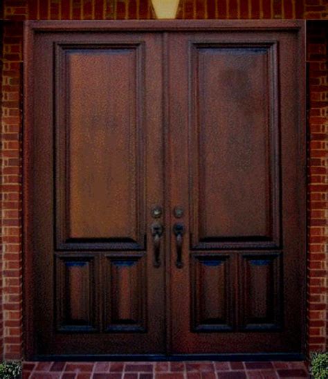 They have a front door, a back door, a side door (usually double doors to bring in large furniture), and possibly a basement door. New home designs latest.: Wooden main entrance Homes doors ideas.