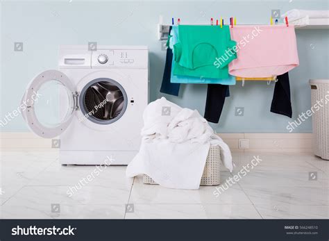 Empty Washing Machine Pile Dirty Cloth Stock Photo Edit Now 566248510