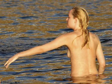 Toplessbeachcelebs Dakota Johnson Swimming Topless In Pantelleria