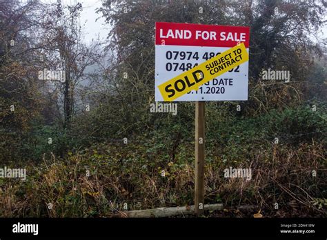 Land For Sale Sign With Sold Banner On It Stock Photo Alamy