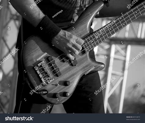 Man Playing Electrical Guitar In Black And White Stock