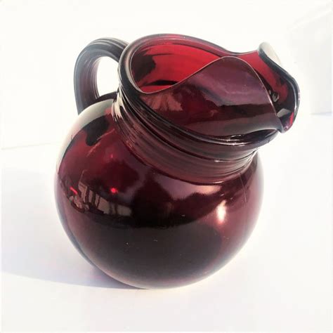 Vintage Anchor Hocking Tilted Royal Ruby Glass Ball Pitcher And Matching Glasses Agrohort Ipb