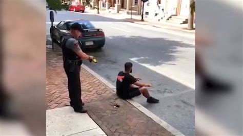 Cop Stun Guns Man Sitting On Sidewalk Cnn