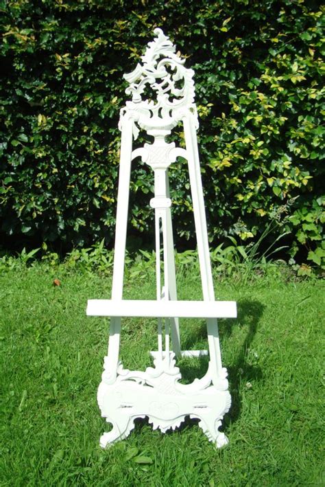 The adjustable shelf can accommodate a large range of sizes and heights. Wedding seating plan easel picture stand painted Farrow ...