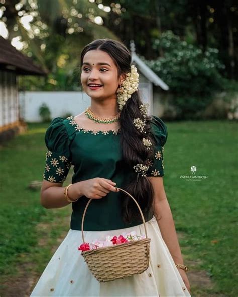 Girls Kerala Traditional Wear Made Of Gold Kasavu Kasavu Skirt And Green Silk Blouse With