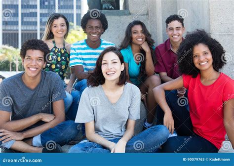 Large Group Of Happy Multiethnic Young Men And Women Stock Image