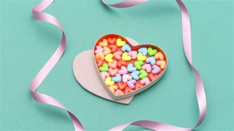 Download Wallpaper 1366x768 Heart Candy Colorful Ribbon Tablet