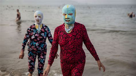 Bizarre Facekinis Fashion Craze Hits China Beaches Amid Record Heat
