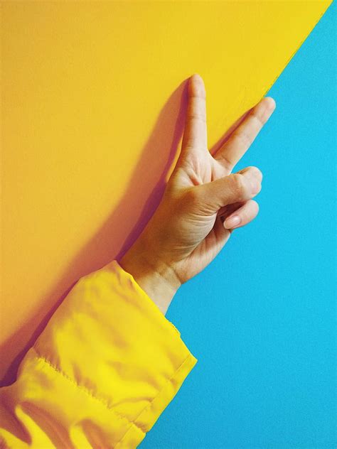 Person Doing Peace Hand Sign Hd Phone Wallpaper Peakpx