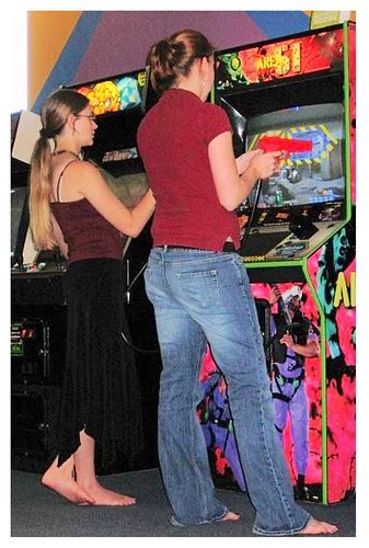 Two Barefoot Females Playing Video Games Just Go Barefoo Justgo