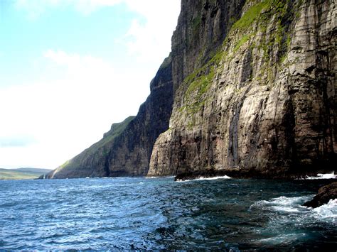 Aerial panorama of massive cliffs of kalsoy on faroe islands. Vertical cliffs | Vertical cliffs, Faroe Islands. Faroe ...