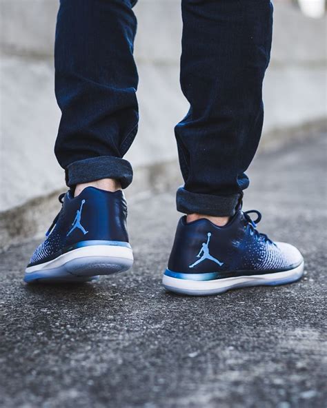 Black covers the toe box, side panels, branded tongues and insoles. Relase Reminder: Air Jordan 31 Low Midnight Navy ...