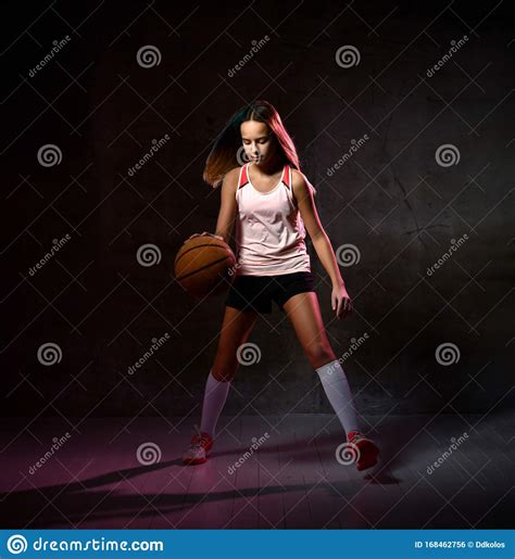 Teenage Girl Dribbling Basketball Stock Photo Image Of Lifestyle