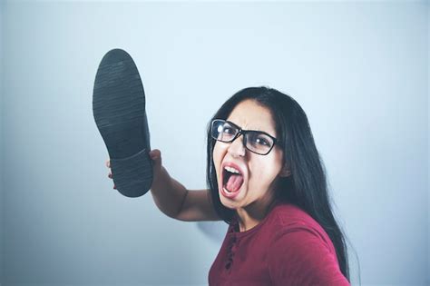Premium Photo Angry Woman Hand Shoes