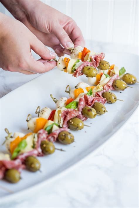 In a small bowl, stir together all remaining ingredients and drizzle over eggs. Antipasto Skewers - The Sweetest Occasion
