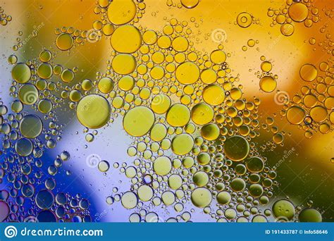 Abstract Background With Vibrant Colours Oil Drops In Water Close Colorful And Artistic