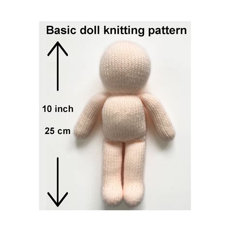 An Image Of A Knitted Doll With Measurements