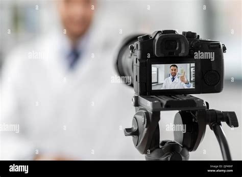 Male Doctor Recording Video Blog At Hospital Stock Photo Alamy