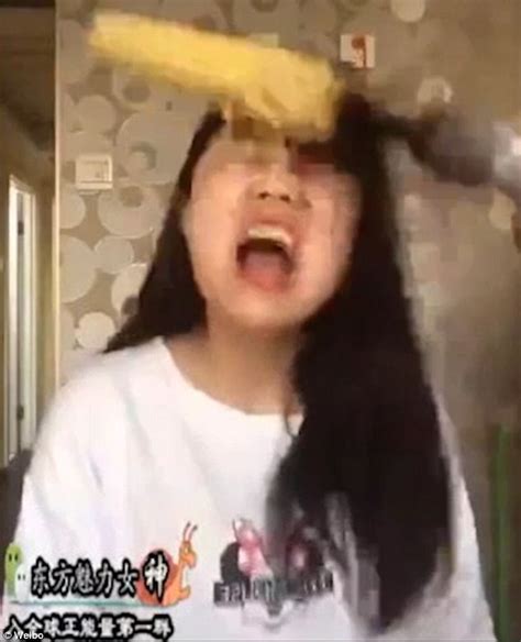 Woman In China Takes On Rotating Corn Challenge And Gets Her Hair