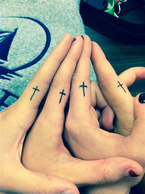 Cross Tattoo On Finger