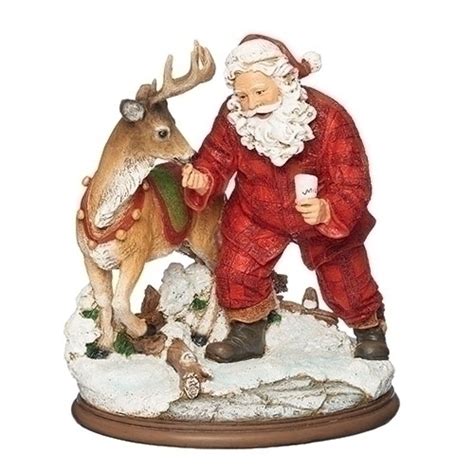 8 5 santa claus feeding the deer with cookie and milk figurine decoration santa and reindeer