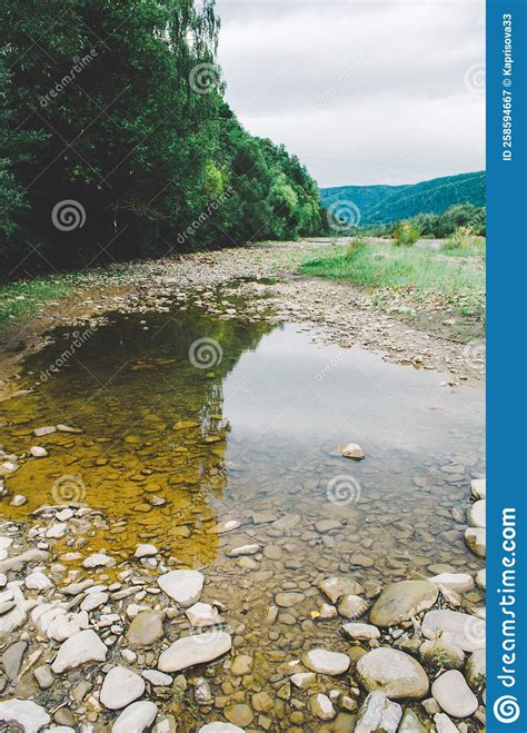 Mountain River Between Sheer Cliffs Blue Clear Water Of The River