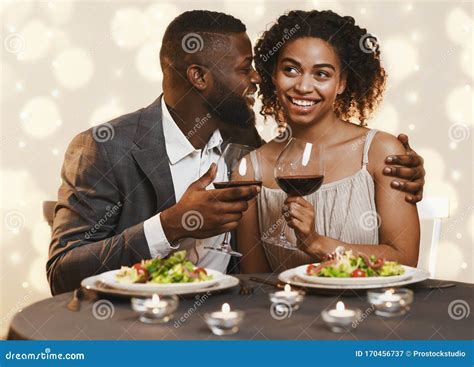 black guy in love courting pretty lady having dinner stock image image of attractive people