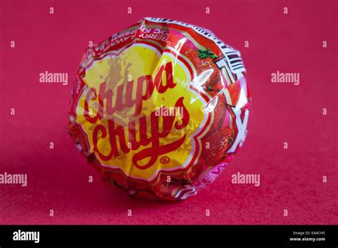 Chupa Chups Berry Flavour Lolly Isolated On Red Pink Background Stock