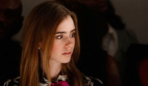 Lily Collins Photos Socialite Lily Collins Poses In The Front Row At