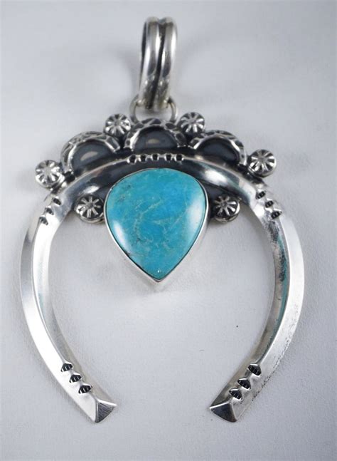 Item N High End Navajo Turquoise Silver Decorated Naja Pendant By