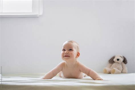 Sweet 6 Months Old Baby Boy Plays With Toys By Stocksy Contributor