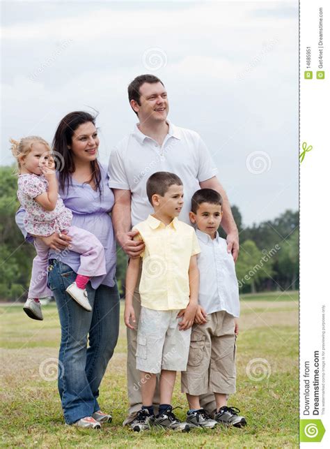Start your family tree by entering your name on the left. Happy Family With Three Kids Looking Away Stock Image - Image of green, grass: 14685951