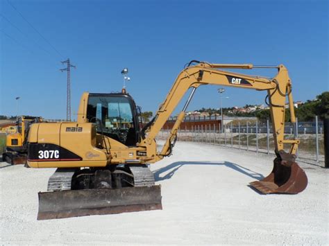 Cat equipment sets the standard for our industry. Mid excavators : CAT 307 C (9 tons) - Zeta Macchine