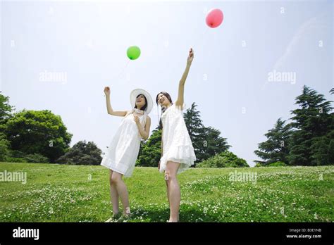 Two Ladies With Balloons Hi Res Stock Photography And Images Alamy