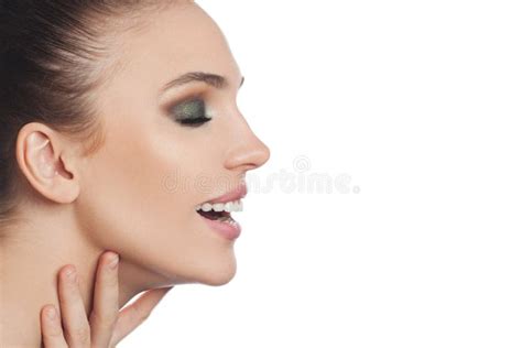Profile Of A Beautiful Young Woman With Make Up With Silver