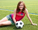 Soccer | Free Stock Photo | A cute young girl posing with a soccer ball ...
