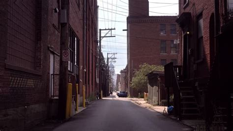 Establishing Shot Of An Alleyway In A Ghetto Looking Neighborhood