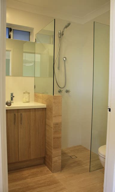 An oval bath cuts corners to boost the impression of space. Our Very Small Ensuite Renovation - Modern - Bathroom ...