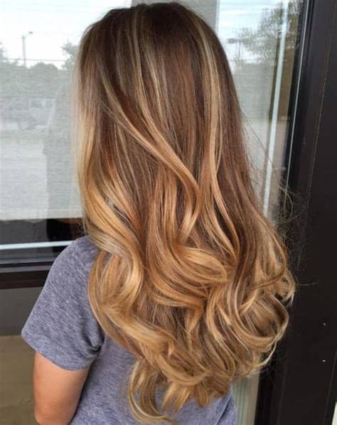 And the hair color is…brown with blonde highlights, also known as bronde. 20 Sweet Caramel Balayage Hairstyles for Brunettes and Beyond