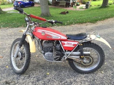 Headlight, electrical switches, kill button, acerbis front fender. 1976 Bultaco Alpina for sale on 2040-motos