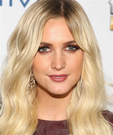 ashlee simpson has really been glamming it up lately—check out her daring hair and makeup looks