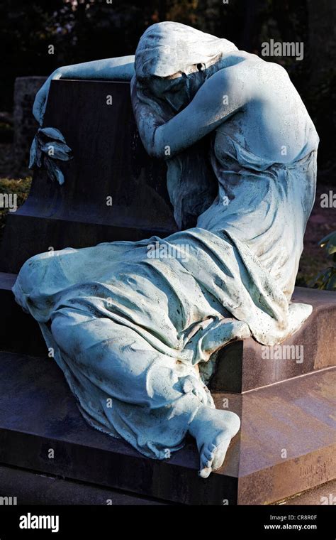 Sculpture Of A Grieving Woman Sitting On A Grave Stone Historic Grave Sculpture Nordfriedhof