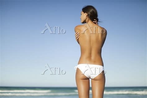 Seminaked Woman In Bikini Bottom Hugging Self By Ocean Rear View Foto Sexiezpicz Web Porn