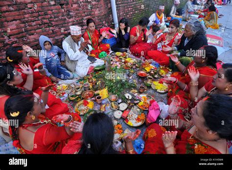 Nepalese Devotees Offering Ritual Prayer At The Bank Of Bagmati River Of Pashupatinath Temple