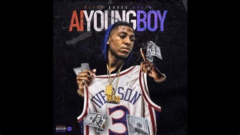 Nba Youngboy Is Wearing Gold Chain And White T Shirt