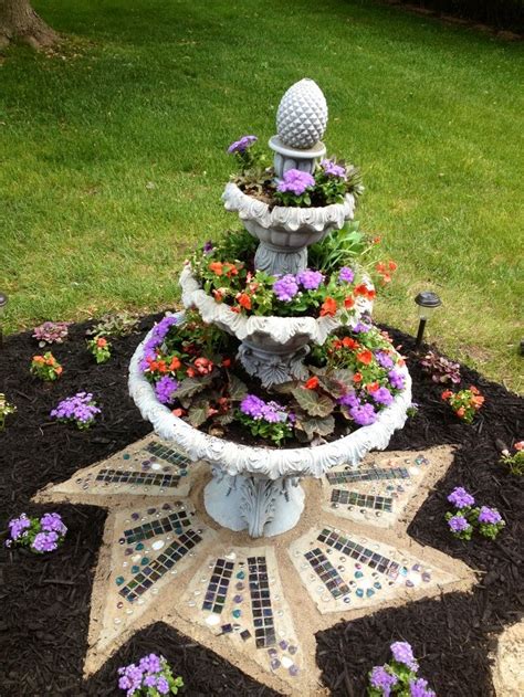 Galvanized water jug water feature. Hoe to decorate a old water fountain | Garden fountain ...