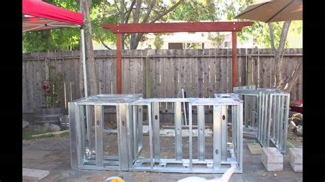 You can use concrete blocks, bricks, wood, metal frame, stucco and the tejas system, just. Building an Outdoor Kitchen Island - YouTube