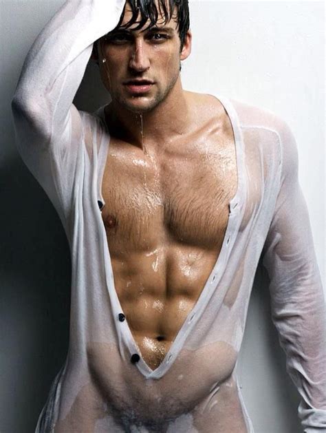 Hunk With Chiseled Abs Wearing A Wet White Shirt The Wet