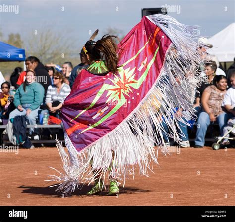 Native American Dancers In Traditional Regalia Perform During A Pow Wow