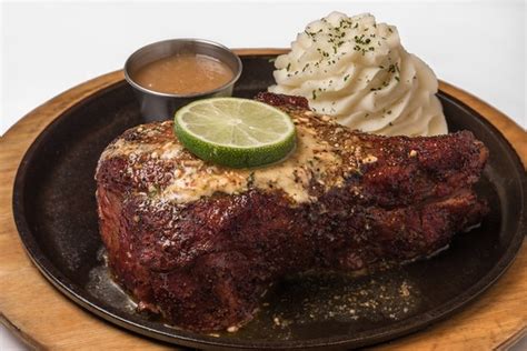 Perry's Steakhouse is serving its pork chop lunch for 79 cents to the ...